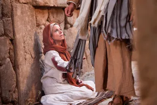 A Woman Touches Jesus' Clothes and is Healed